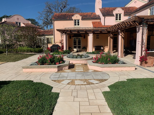 New landscaping around a paver patio installed at a property in Lakeland Highlands, FL.