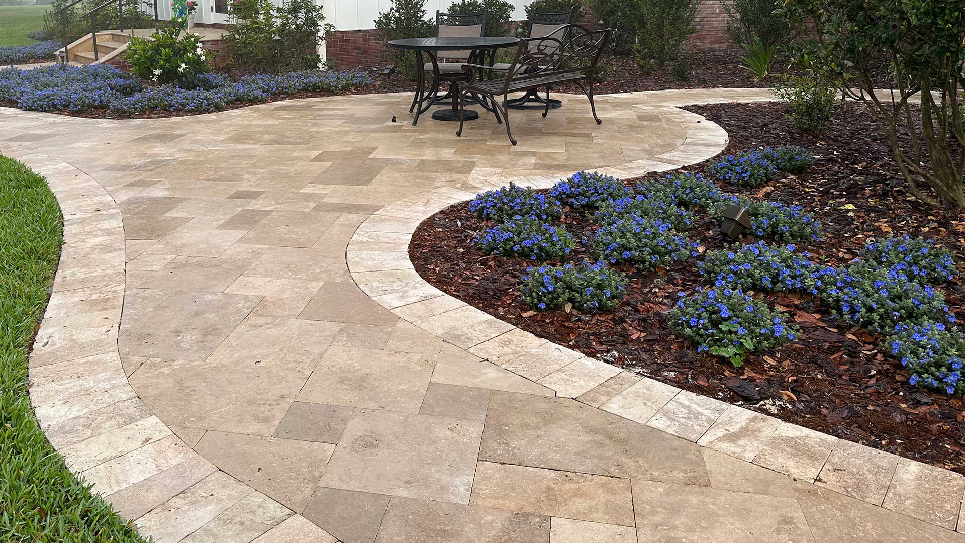 Patio paver and walkway with new landscaping at a home in Bartow, FL.